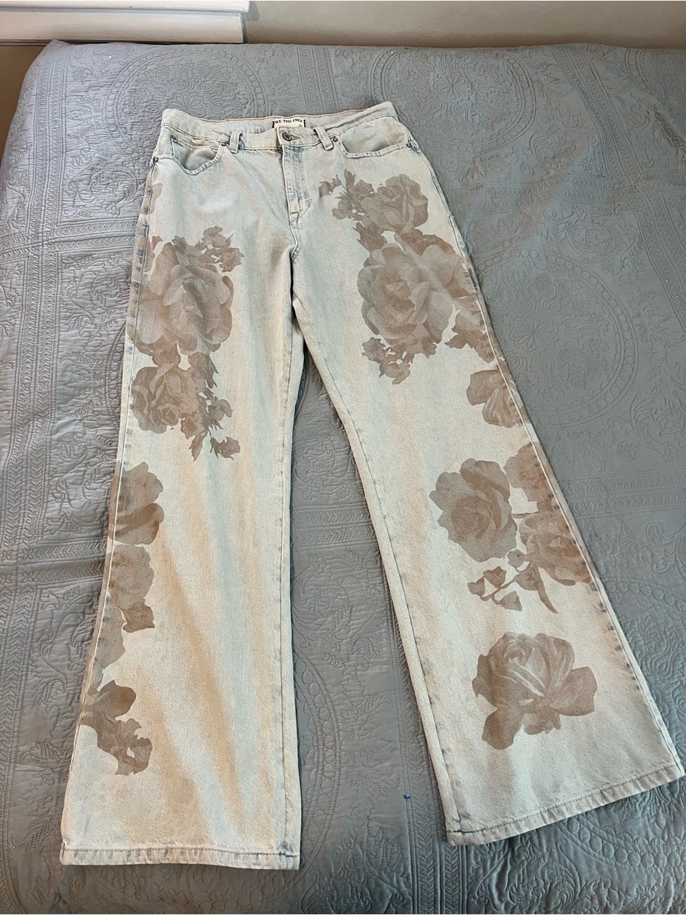 Free People Light Wash Wide-Leg Jeans with Beige Floral Print